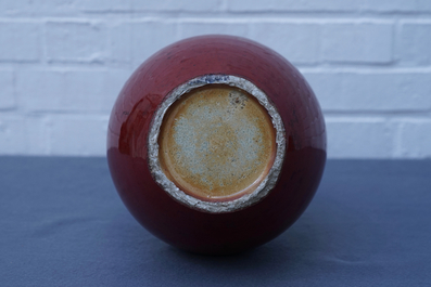 A Chinese monochrome oxblood-glazed bottle vase, 19th C.